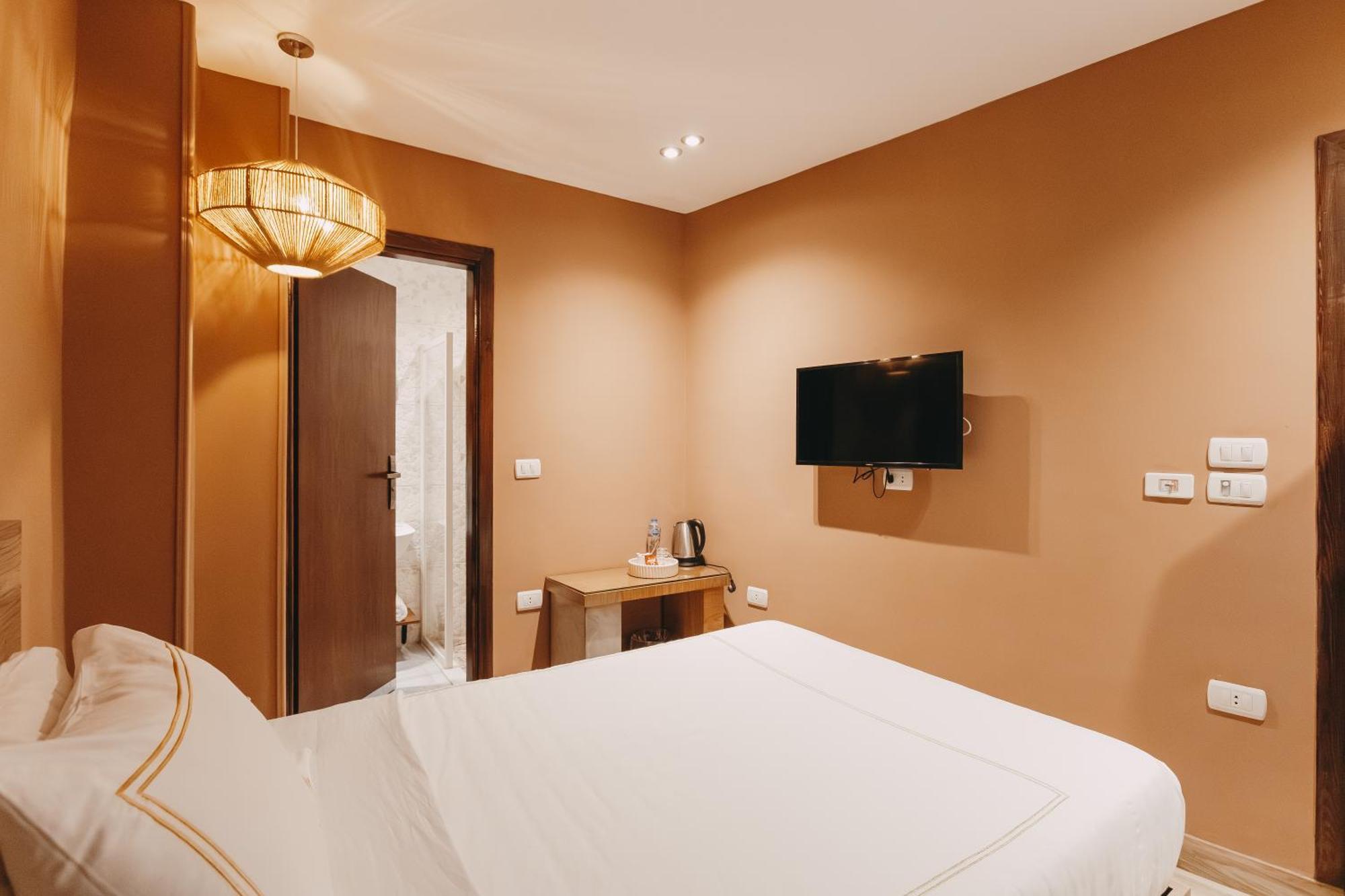 Kafret el-Gabal Almas Pyramids View Hotel מראה חיצוני תמונה